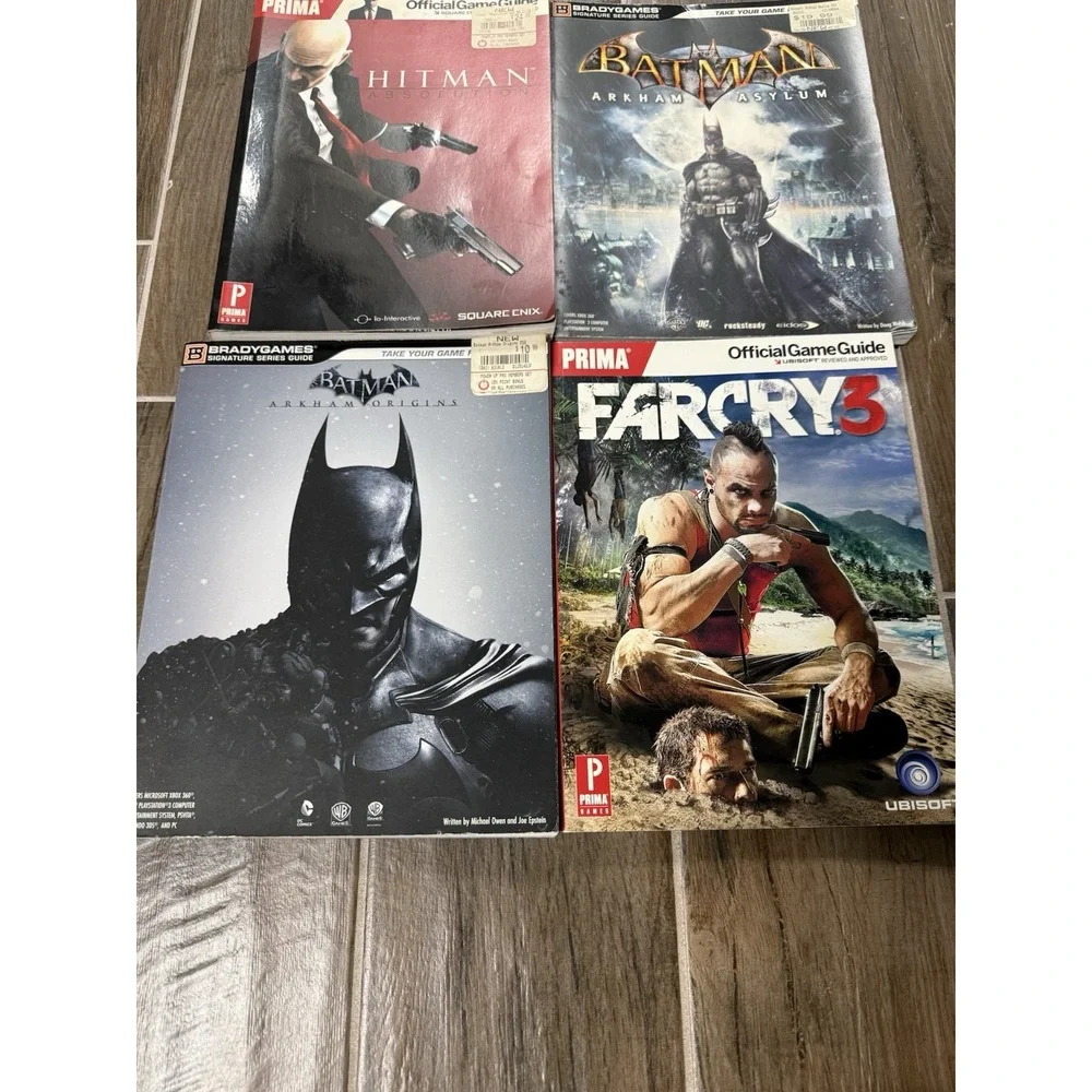 Lot of 4 Official Video Game Guides Brady/Prima Batman, Hitman, Far Cry